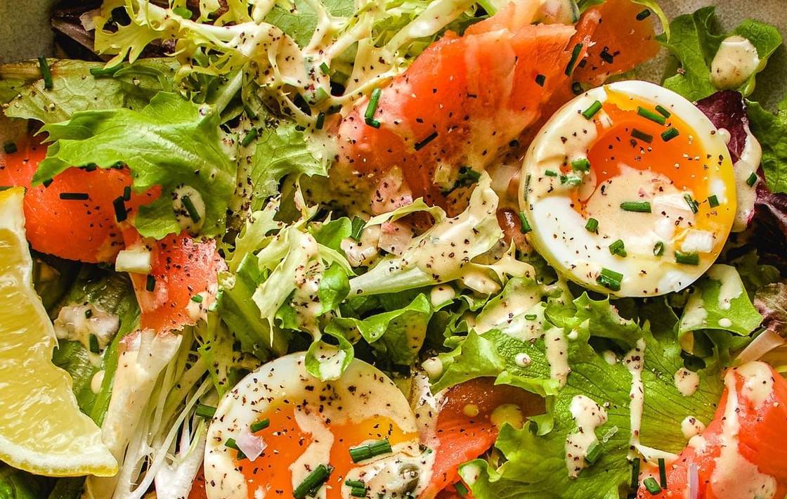 Smoked salmon and jammy egg salad with frisée, chives and a creamy mustard dressing